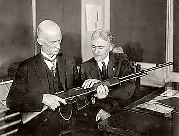 Weapons Inventor John Browning with his BAR