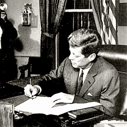 President Kennedy signs quarantine order during Cuban Missile Crisis
