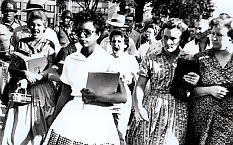 A Little Rock Nine Student with a crowd of her admirers