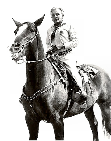 Composer Frederick Loewe riding in a parade