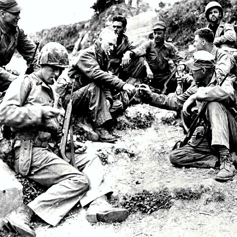 War correspondent Ernie Pyle with troops