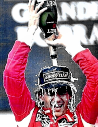 Formula 1 driver Ayrton Senna celebrating a Victory