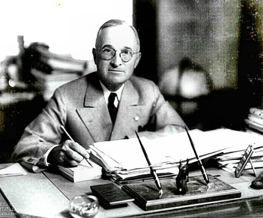 President Harry S. Truman at his desk