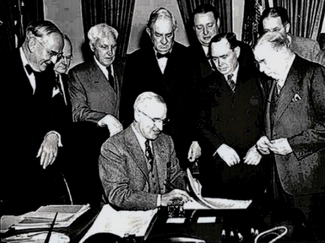 President Truman signs the Marshall Plan
