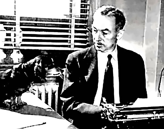 E.B. White at work with his dog